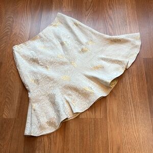 Elegant embroidered cream and gold floral fit and flare skirt. Size 8P.